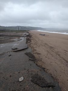 Edge of the Memorial car park at Slapton Line broken away after a storm in March 2018